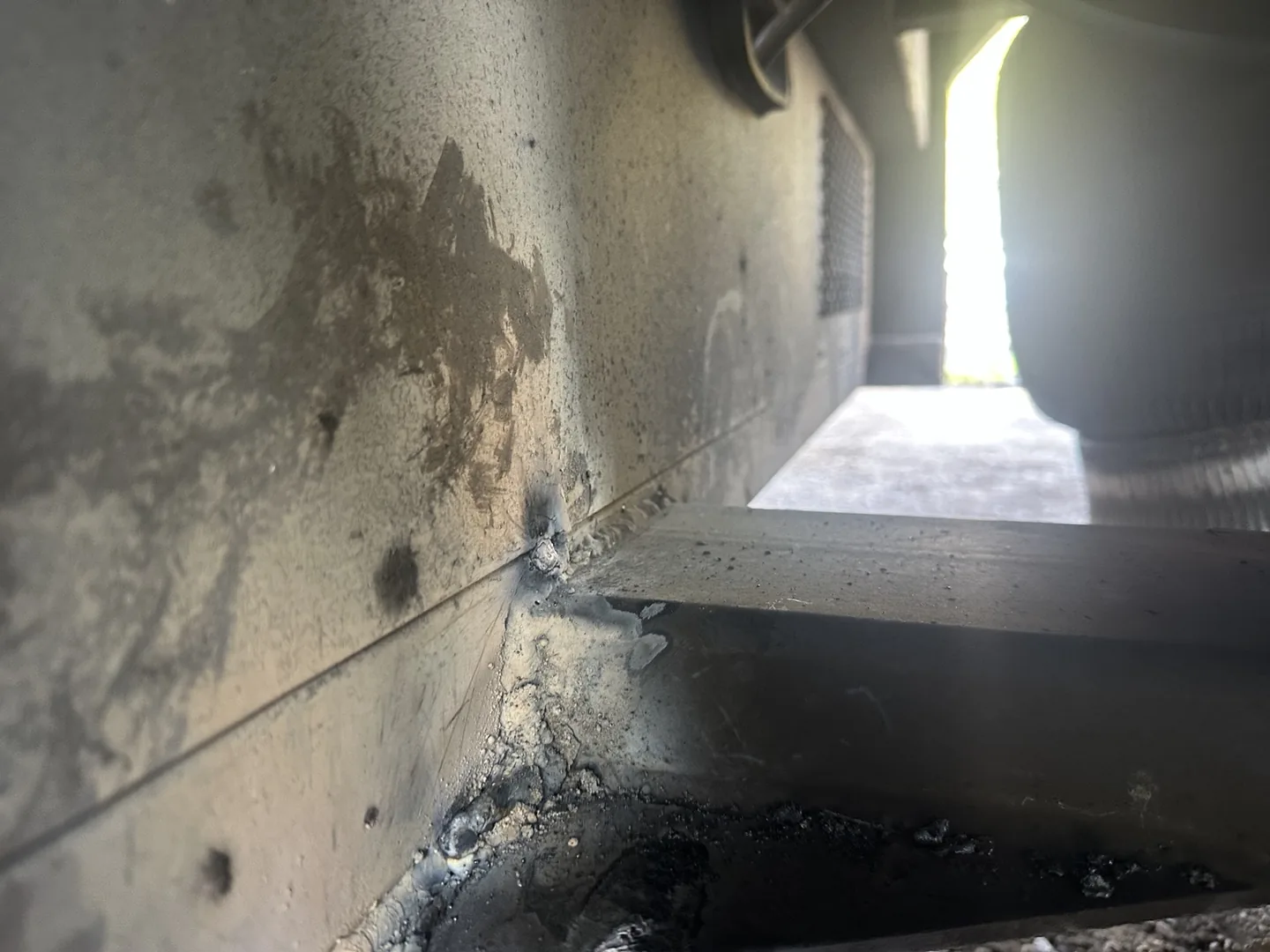 Inside view of the reinforcement plate and welds at the trailer frame connection