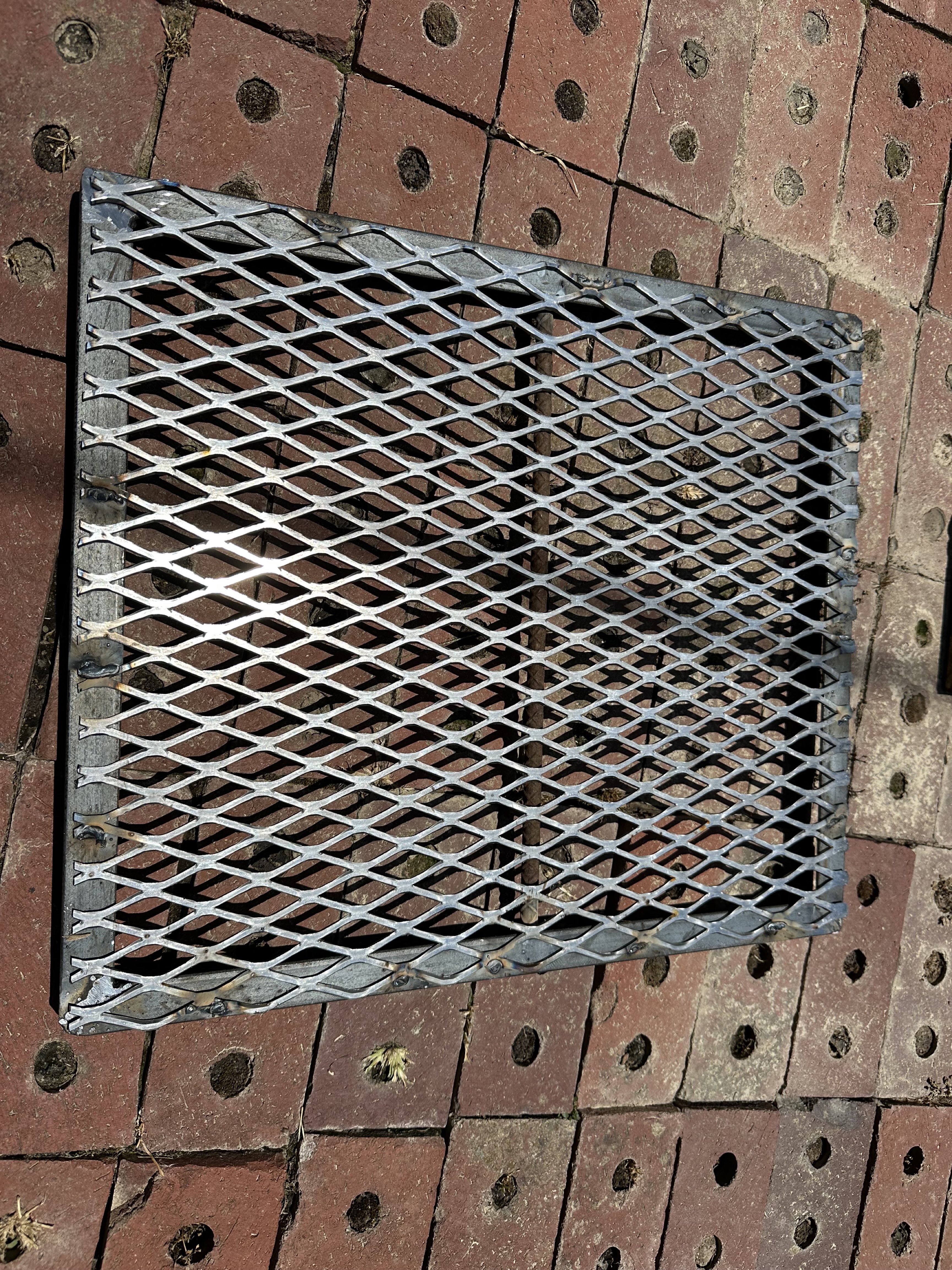 Completed steel expanded-metal panel repair by K&G Welding