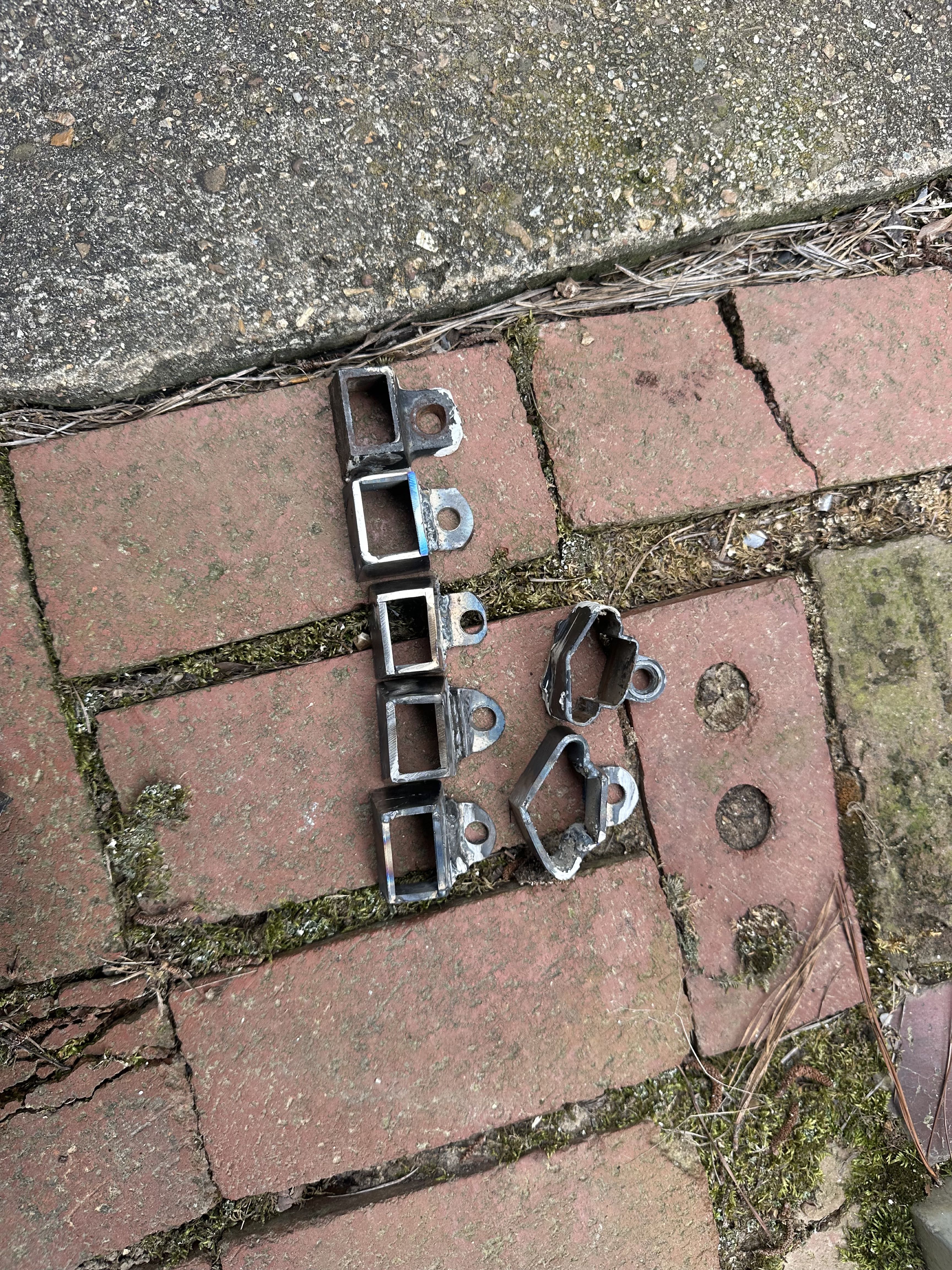 New steel brackets welded during a trailer deck rebuild
