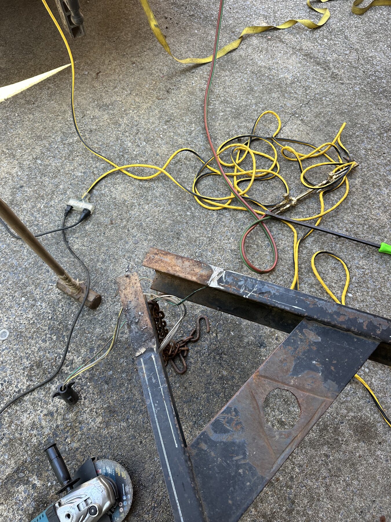 Damaged trailer hitch cut off and removed