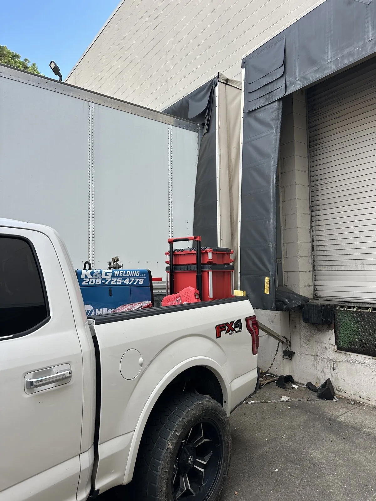 K&G Welding mobile service truck at a commercial loading dock